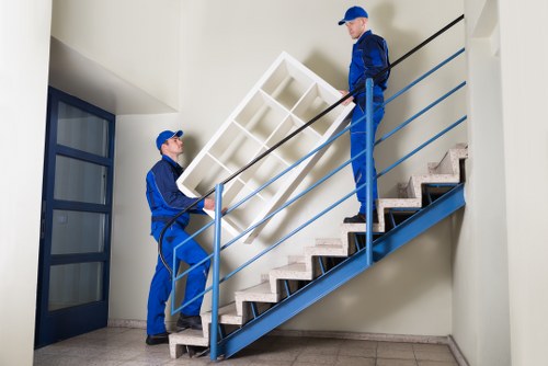 Dulwich moving specialists handling fragile items during a well-organized relocation