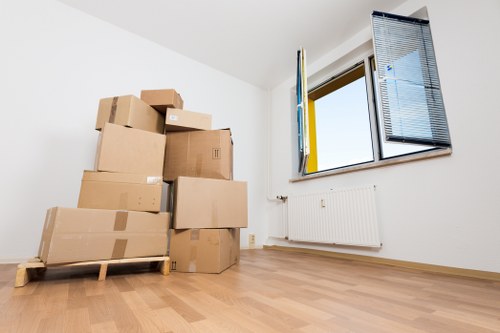 Removal team handling house moving in Dulwich residential street