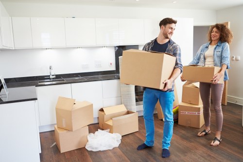 Preparing items for collection by a man with a van