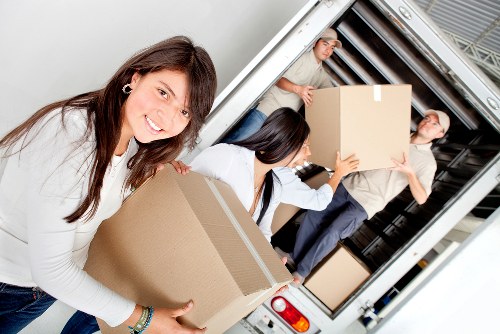 Packed office furniture and equipment ready for relocation