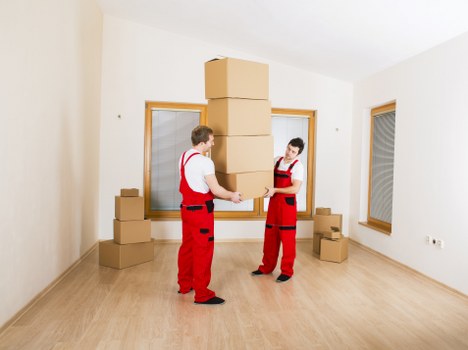 Local moving team navigating Dulwich streets with furniture and packing materials